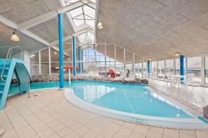 a large swimming pool in a large building at C11699-Hemmet-Vester-Faelled-70-A5 in Hemmet