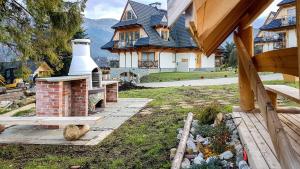 Vonkajšia záhrada v ubytovaní Apartamenty Polana Sywarne Zakopane