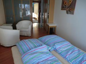 Postel nebo postele na pokoji v ubytování Haus Zervreila