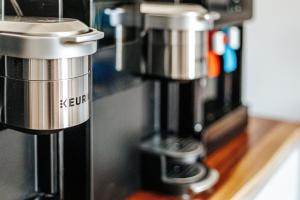 a coffee machine sitting on top of a counter at Grey Pine Lodge in Waynesboro