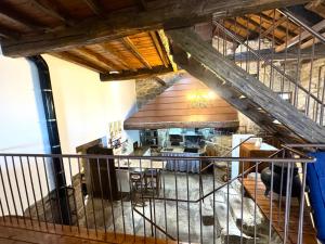 an overhead view of a kitchen and dining room in a house at A Casa do Ferreiro in Cerdedo +33 photos