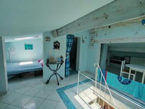 a bedroom with a bunk bed and a pool at Villa du Capelan - BANDOL in Bandol