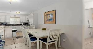 a kitchen and dining room with a table and chairs at Nature Lovers Paradise in Inverness