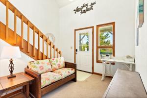 a living room with a couch and a table at 8396 - White Dune in Avon