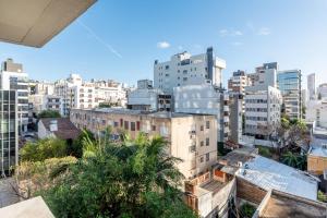 a view of a city with tall buildings at GO24 by LikeHome in Auxiliadora