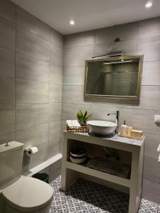 a bathroom with a sink and a toilet at ΑtoZ studio in Hydra in Hydra +7 photos
