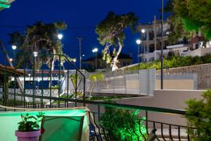 a view of a street at night with lights at Kaplanis House in Neos Marmaras