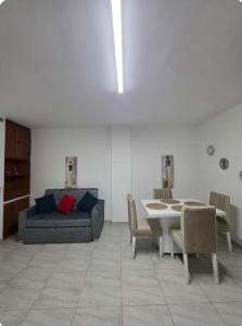 a living room with a couch and a table at EDIFICIO BENHUr in Cúcuta