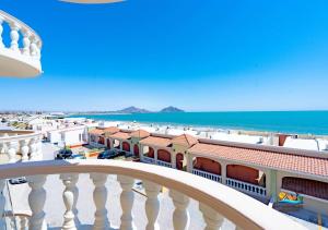 a view of the beach from the balcony of a building at Jerry in San Felipe