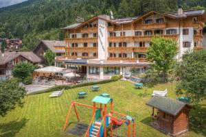 an aerial view of a hotel with a playground at Hotel Bellavista in Pinzolo +39 photos