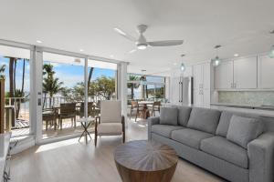 a living room with a couch and a table at The Hale Pau Hana in Kihei