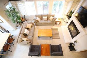an overhead view of a living room with a couch and a tv at Sunnyside 6 in Condo Waterville Valley in Waterville Valley