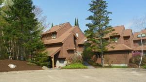 a large house with a large house at Forest Rim I1 WV Pet Friendly Ski Vacation Condo in Waterville Valley in Waterville Valley