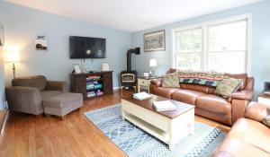 a living room with a couch and a chair at Bog Road 76 Campton Cozy Private Single Family Home in Campton in Campton