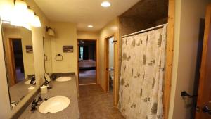 a bathroom with two sinks and a shower at Welch View 41 Thornton Private Home Close to Waterville Valley in Thornton