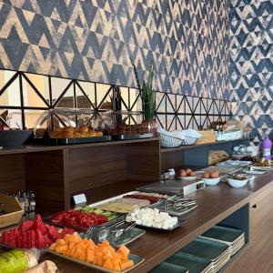 a buffet line with many different types of food at Hotel Sutomore & Apartments in Sutomore