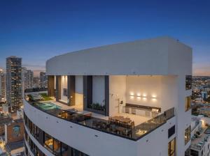 a building with a view of a city at Chic Luxury 1BR Oasis in Miami