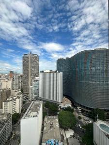 a view of a city with tall buildings at U House in São Paulo