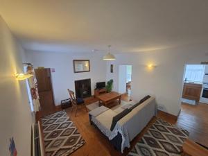 a living room with a couch and a table at Derryhick Escape in Crillaun
