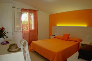 Postel nebo postele na pokoji v ubytování Stromboli Beach Tropea + 18 fotografií