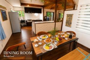 a dining room table with plates of food on it at Ranked 1 in the Izu Mount Fuji from the villa in Izunokuni