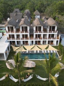 an aerial view of a hotel with a swimming pool at Hali, El Paredón in Sipacate +48 photos