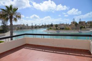 a view of a river from a balcony at Virginia beach village in El Alamein +3 photos