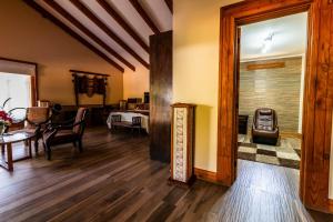 a living room with a table and a dining room at Hotel Boutique Refugio El Molle in El Molle +42 photos