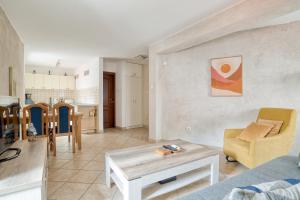 a living room with a couch and a table at Historic Old Town Kotor in Kotor +20 photos