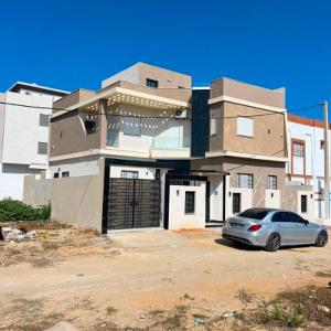 a car parked in front of a building at Villa Jenna in Kelibia