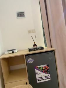 a beetle sitting on top of a refrigerator at Residence Emilienne in Cotonou