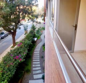 a stairway leading to the balcony of a building at Depar 1 Dormitorio B in Cochabamba +2 photos