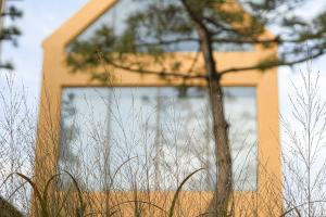 a building with a window in front of it at Seesun Art Studio Villa in Ansan +10 photos