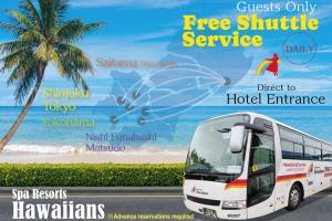a bus on a road with a picture of a beach at Spa Resort Hawaiians Monolith Tower in Iwaki