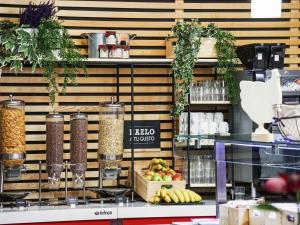 a store display with food on a shelf at Ibis Girona in Girona