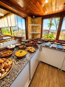 a buffet line with many different types of food at Sakli Cave House in Avanos