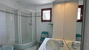a bathroom with a sink and a shower and a tub at Le gîte de montréal in Saint-Germain-les-Belles +24 photos