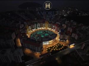 an aerial view of a soccer stadium at night at Krishna Cottage 3BR Apt By Amoret Homes in Chicalim
