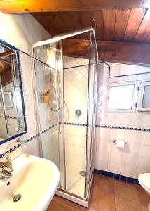 a bathroom with a shower and a sink at JP House Amalfi in Amalfi