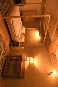 an overhead view of a room with a bed at Kainchi Boutique Homestay in Rāmgarh