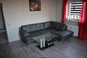 Posezení v ubytování Ferienwohnung Am Steinberg