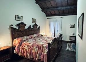 a bedroom with a large bed in a room at Residence Oasi del Delta in Taglio di Po