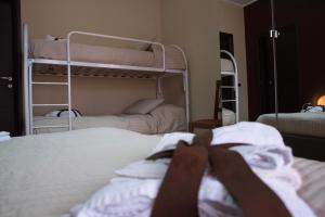 A bed or beds in a room at Il Centro Short Lets
