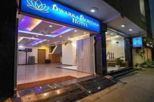 a hotel lobby with a sign for a hotel at FabHotel Dwarka Heritage in New Delhi