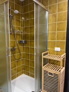 a shower with a glass door in a bathroom at Ci Thorno Hotel in Crosia +162 photos