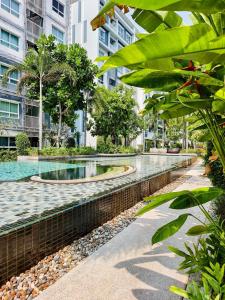 a swimming pool in the middle of a building at Condo in Hua Hin in Hua Hin