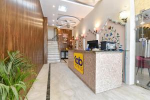 a lobby of a hotel with a reception desk at FabHotel Moon Stone, Near Jawahar Circle - World Trade Park in Jaipur
