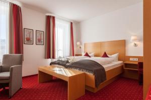 Postel nebo postele na pokoji v ubytování Hotel Waldhorn