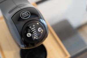 a close up of a remote control on a car at Velis - art & hospitality in Posada