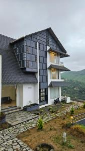 a house on top of a hill with at Celestial Nymph by Natureloom in Vagamon